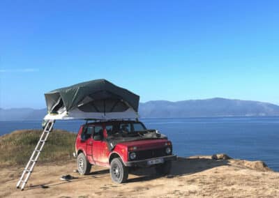 Camping by the beach with a rooftop tent